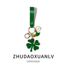 Car keychain leather lucky grass car keychain pendant creative four-leaf clover key ring chain car key ring