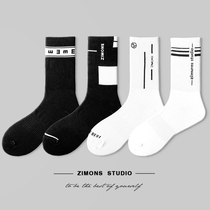 4 pairs of ink mens Tide brand long socks personality autumn thin Street shooting simple ins black and white cotton socks high