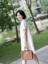 I am Capricorn RuienCo temperament heavy industry silk wool silk wool jacquard small round neck rice white dress