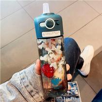 Japan food grade plastic high-value childrens straw water cup Womens summer ins wind net red portable sports