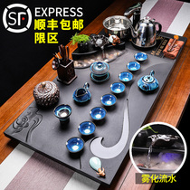Whole piece of black gold stone tea tray kung fu tea set home black stone tray large atomized flowing water Stone tea table