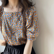One-word collar short-sleeved chiffon shirt womens summer 2021 new retro loose foreign style age-reducing floral blouse shirt tide