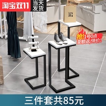 Clothing store window display stand simple high and low running water table shoes bag rack model props landing Booth