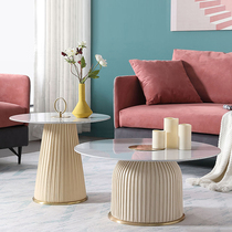Light luxury designer coffee table simple metal marble texture corner model room round wrinkled leather round side