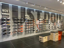 New Nike sports shoes shelf Jersey sneakers showcase backpack socks on the wall Tide brand shoe store display rack