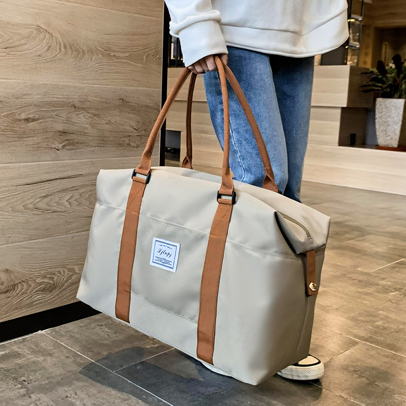 Travel bag, women's short distance luggage storage bag, travel handbag, student large capacity canvas lightweight travel bag