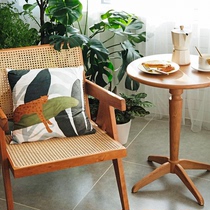 Nordic rattan chair B & B balcony retro wooden solid wood back chair Japanese armrest dining chair ins medieval chair