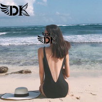 DK one-piece swimsuit female Korean black simple sexy belly triangle deep V backless hot spring beach vacation swimsuit