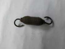 Vertical packaging machine tension spring