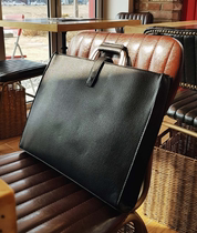 Tomonari Korean mens new black clutch leather bag handbag