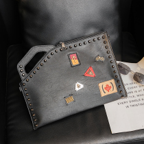 Tide Personality Rivets hand grip bag Street head Fashion cortical handbag New male and female single shoulder bag File Package
