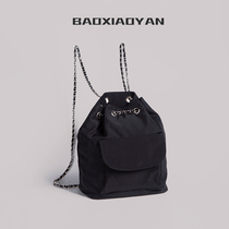 Shoulder bag womens simple leisure commuter chain Han wind ins student drawstring black large capacity bucket bag