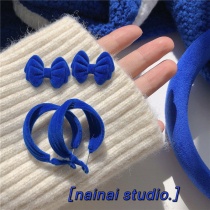 Klein blue flocking earrings ~ ins cold wind temperament twisted thick earrings autumn and winter bow earrings