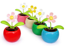 Shaking head car interior ornaments solar Apple flower car ladies car accessories Daquan sunflower supplies small