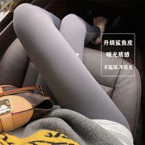 Black shark fish leather beating bottom pants woman outside wearing summer slim fit high waist close-up elastic hip yoga Barbie pants