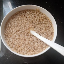 Xinchang specialty rice sea tea Shengzhou specialty snacks rice flat crispy glutinous rice fried rice Camellia 250g traditional homemade