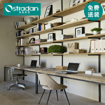 Solid wood long table against the wall with row office computer desk studio one wall double desk bookshelf one long table