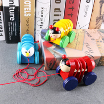 Baby dragging and pulling caterpillar toy small trailer Young children pull car roller toddler pull walking hand rope