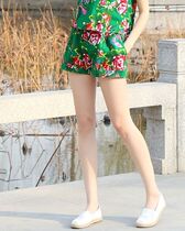 Northeast big flower cloth ethnic style summer men and women net red three-point shorts loose couple beach shorts