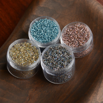 Japan TOHO Dongbao 3cut dye core rice bead 12 0 end Three-section 2mm5g string bead method Embroidery Shuttle