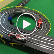 Childrens track racing function is the same as the hand-cranked power generation rail hybrid Lane racing remote control track double toy