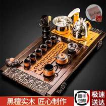 A complete set of Kung Fu tea sets ebony solid wood tea tray sets household living room office meeting guests automatic all-in-one tea table