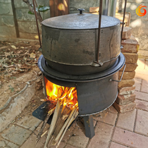 Rural wood burning stove wooden stove winter outdoor picnic boiling water cooking old-fashioned material stove large iron thickening