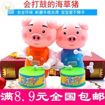 On the chain drumming piglets drumming toys clockwork small toys childrens educational stalls supply Piggy pigs