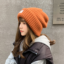 Hat female autumn and winter fashion Joker pile cold hat warm ear protection suitable for round face face face small knitted wool hat