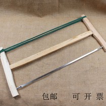 Old-fashioned traditional carpenter saw cutting Bird Saw Manual saw narrow saw blade large frame saw