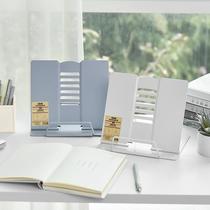 Class 2 students in the third year look at the bookshelf simple table metal reading rack reading bookshelf creative book holder rack
