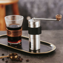 One person with portable hand-cranked coffee bean grinder manual coffee machine manual coffee machine household small