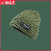 Japanese patch wool hat female fashion Joker foreign style men and women same multi-color knitted warm ear hat tide