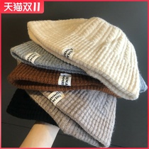Soft hand mohair knitted retro twist label basin hat female Korean winter solid color wild warm fisherman