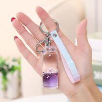 Little pig drifting bottle key chain pig liquid pendant male and female girls same glass bottle milk floating super cute