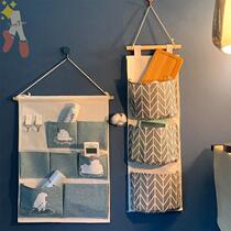The storage basket with the key at the door the wall-mounted ornaments the wall hanging at home the Nordic door and the bag rack