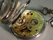 The large eight pocket watch porcelain plate has slight damage