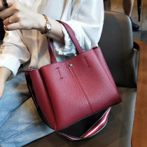  Bag female 2021 new Korean version of the first layer cowhide simple fashion tote bag portable shoulder messenger high-end womens bag