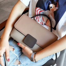  2021 new Korean version of the first layer cowhide contrast color shoulder messenger small portable leather womens bag fashion trendsetter