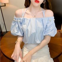  2021 summer new design sense niche one-word collar super fairy quality top tide pearl cross sling shirt women