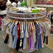 Childrens clothing store shelf clothing rack round rotating middle display stand simple middle island rack floor hanging clothes rack