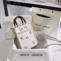 Hong Kong MackJarein leather niche small daisy tote bag 2021 new summer portable messenger bag for women