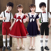 61 children acting out of girl red gown dance dress Pupils for big choral boys recite the performance costumes