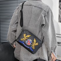 Hong Kong 21 new embroidered pattern shoulder bag square bag Korean mens bag casual fashion shoulder bag small backpack