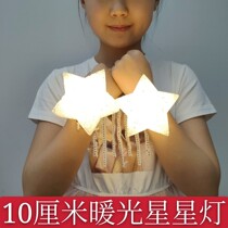 Stage performance holding a star lamp single hand holding the festival dance chorus decorative hand with luminous pentagram props