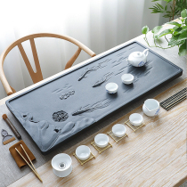Wu Jinshi tea tray Whole household natural stone creative custom tea table Kung Fu tea set Tea sea relief tea tray