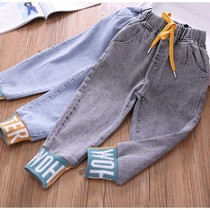 Autumn and winter clothes New plus velvet thickened girl jeans letter small feet pants Korean version of childrens loose fashion casual pants