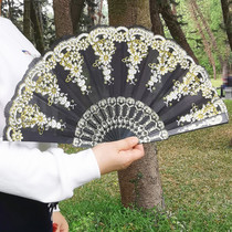 Easy opening and closing wedding fan Spanish dance plastic pole folding fan Lady classical print ballet Chong spring fan hot sale