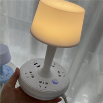 The small surprise is multi-purpose socket USB bedside intelligent remote control desk lamp