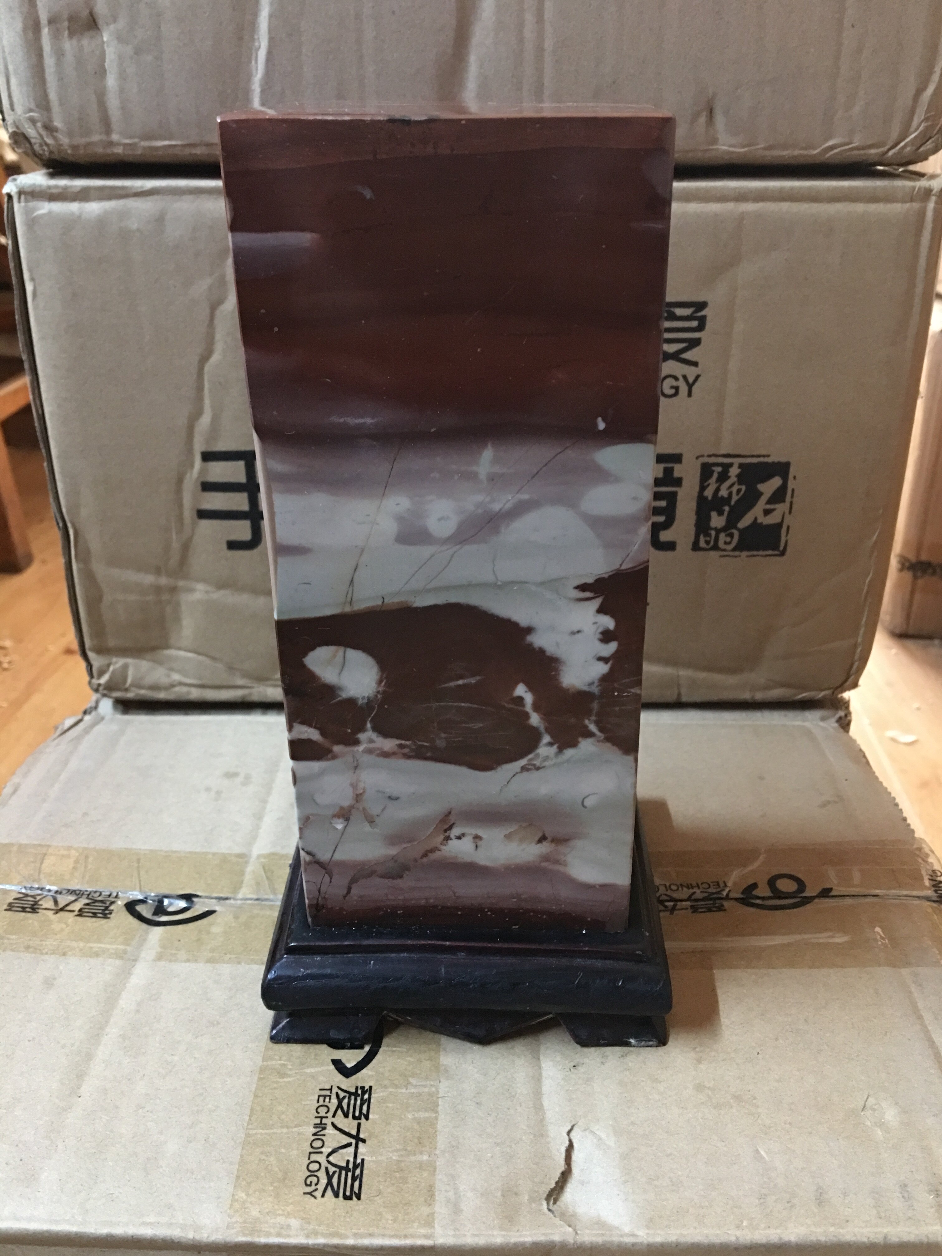 Natural grass flower stone national painting stone yushu stone red jade stone original stone ornamental stone on the ancient stone painting Hongyun head